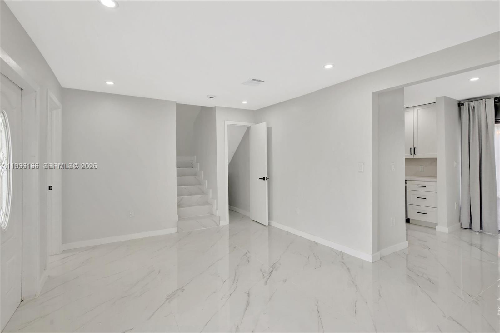 3916 Northwest 207 St Road Miami Gardens, FL 33055 - Photo 8 of 38 a view of an empty room