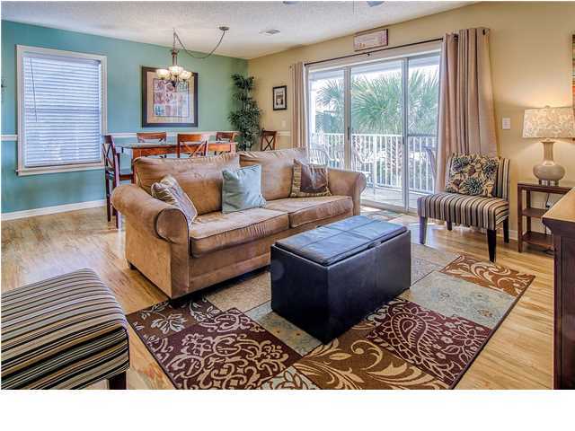 11 Beachside Drive, Unit 1023 Santa Rosa Beach, FL 32459 - Photo 1 of 24 a living room with furniture and a large window