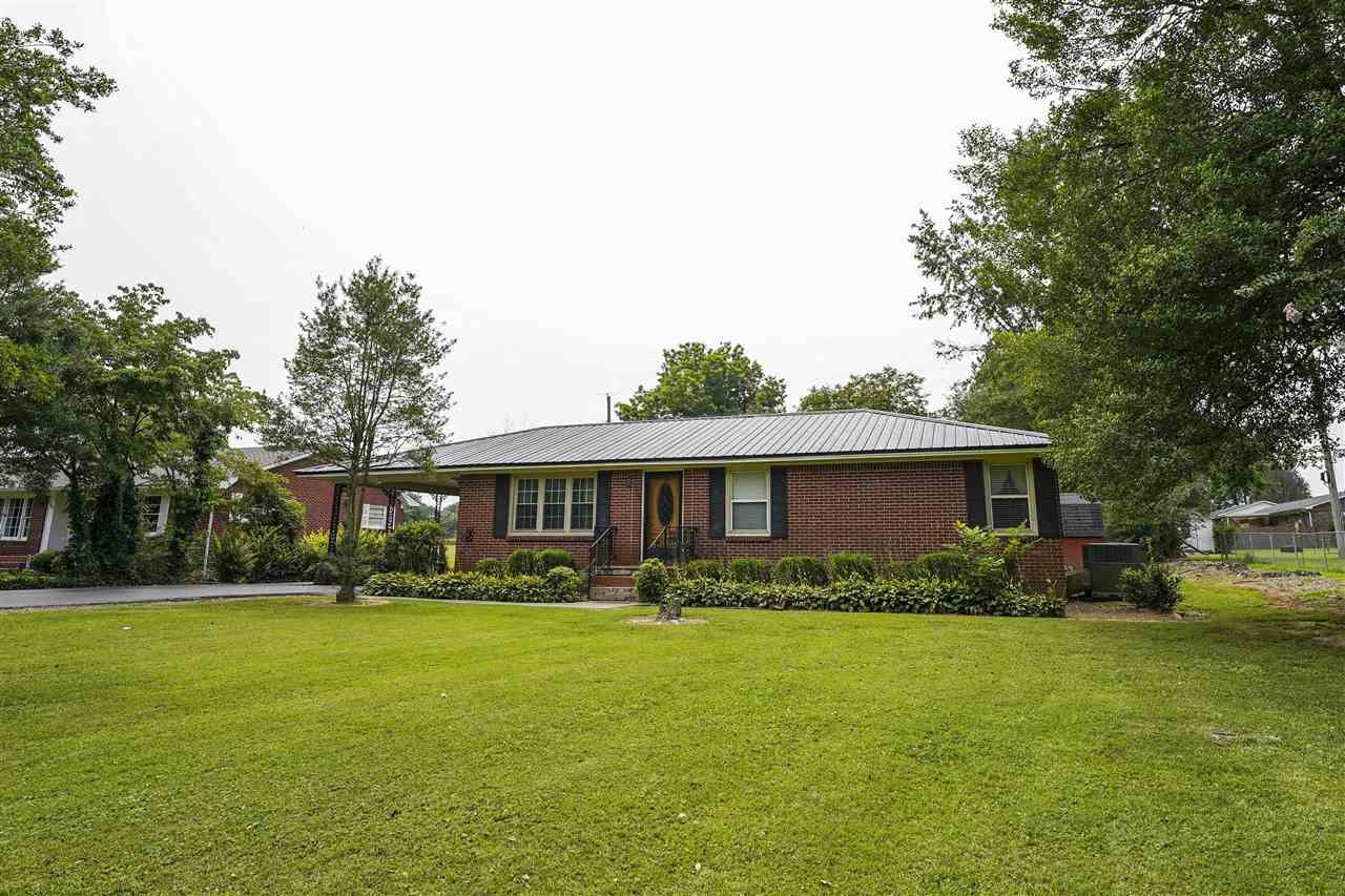 309 Hopper Street Rutherford, TN 38369 - Photo 1 of 14 a front view of house with yard and green space
