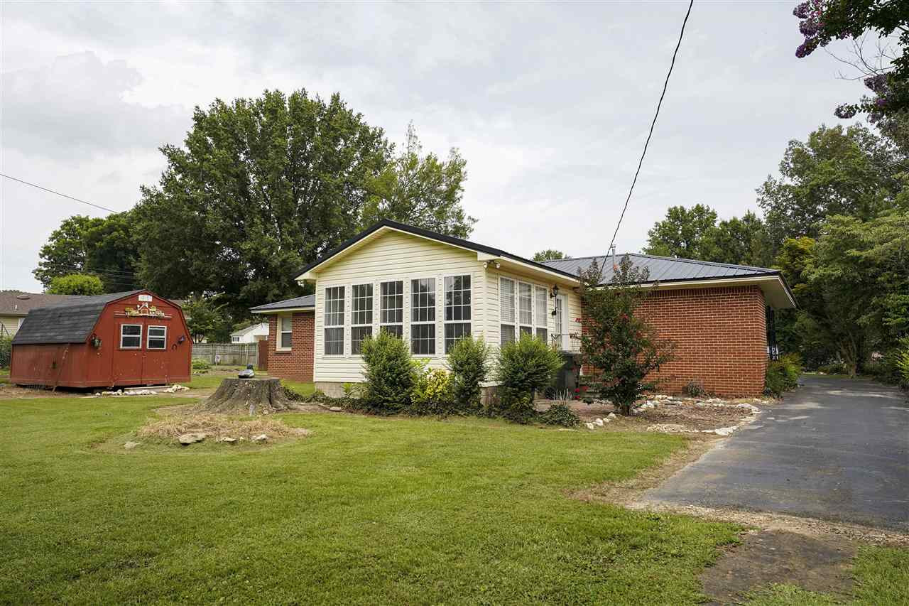 309 Hopper Street Rutherford, TN 38369 - Photo 12 of 14 a front view of house with yard and green space