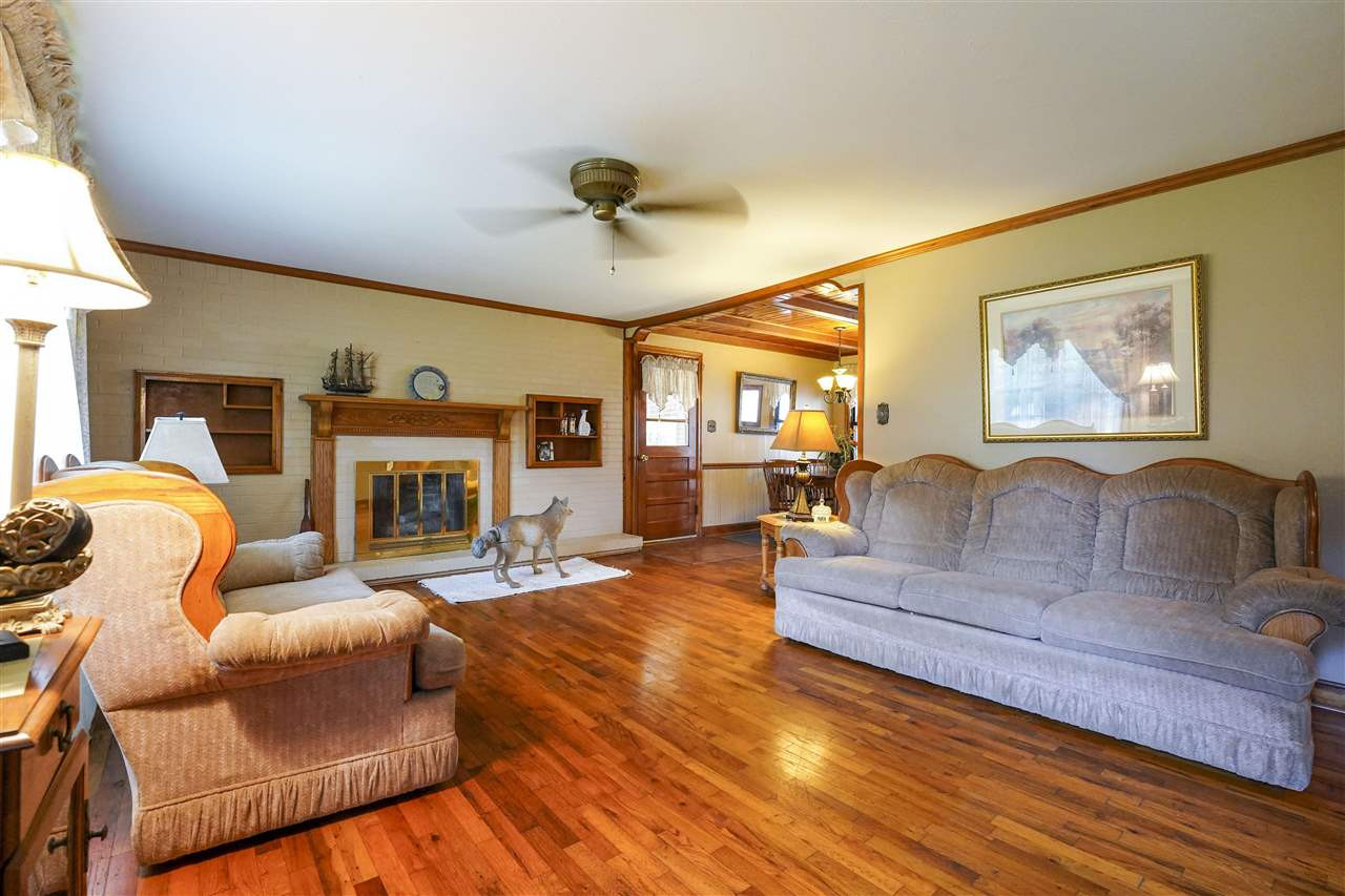 309 Hopper Street Rutherford, TN 38369 - Photo 3 of 14 a living room with fireplace furniture and a fireplace