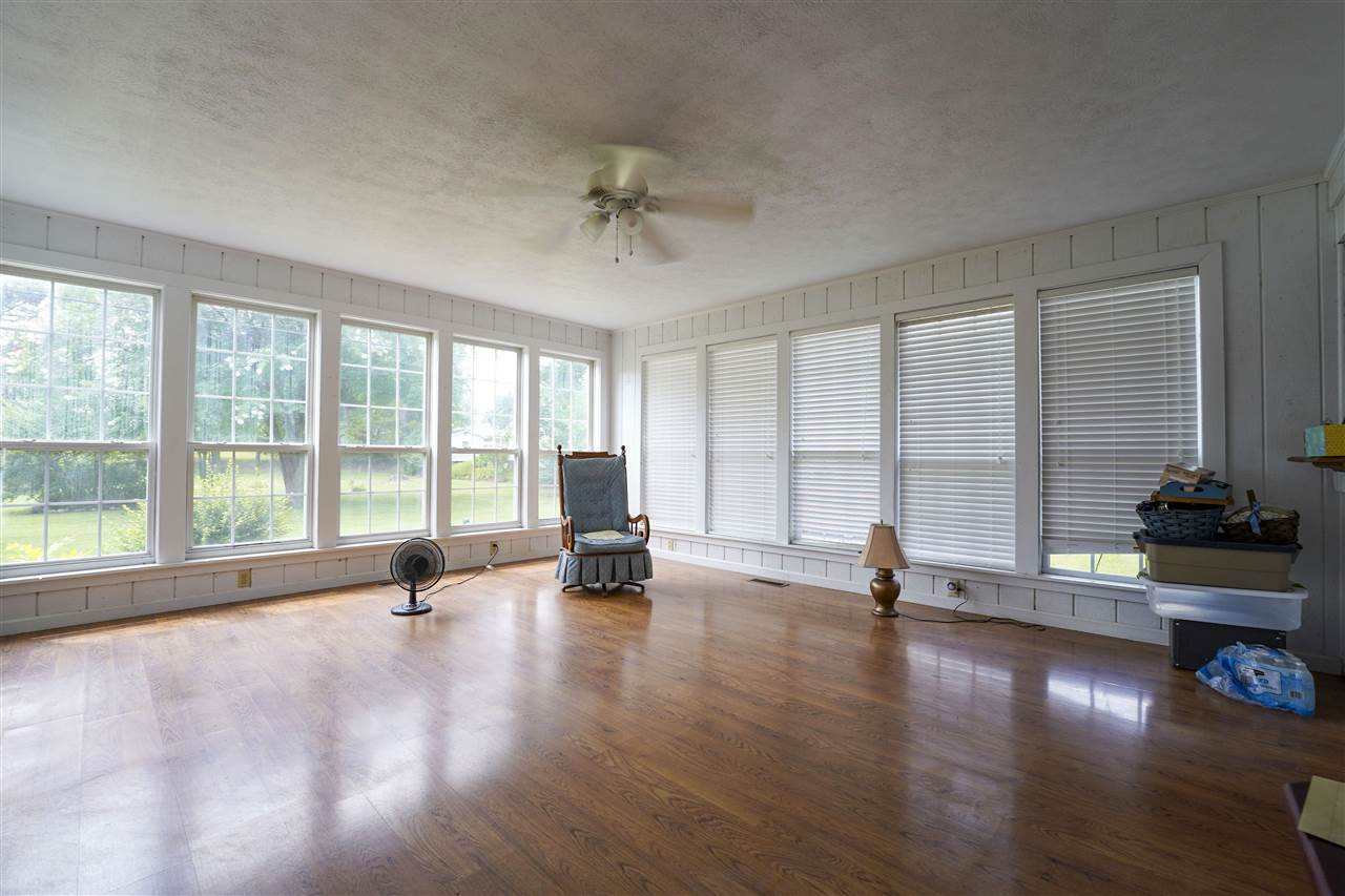 309 Hopper Street Rutherford, TN 38369 - Photo 6 of 14 a view of an empty room with glass door and windows