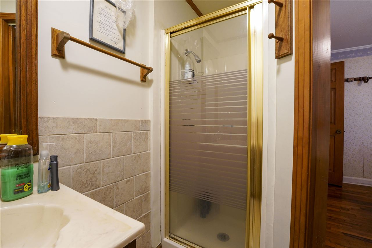 309 Hopper Street Rutherford, TN 38369 - Photo 8 of 14 a bathroom with a shower and a sink