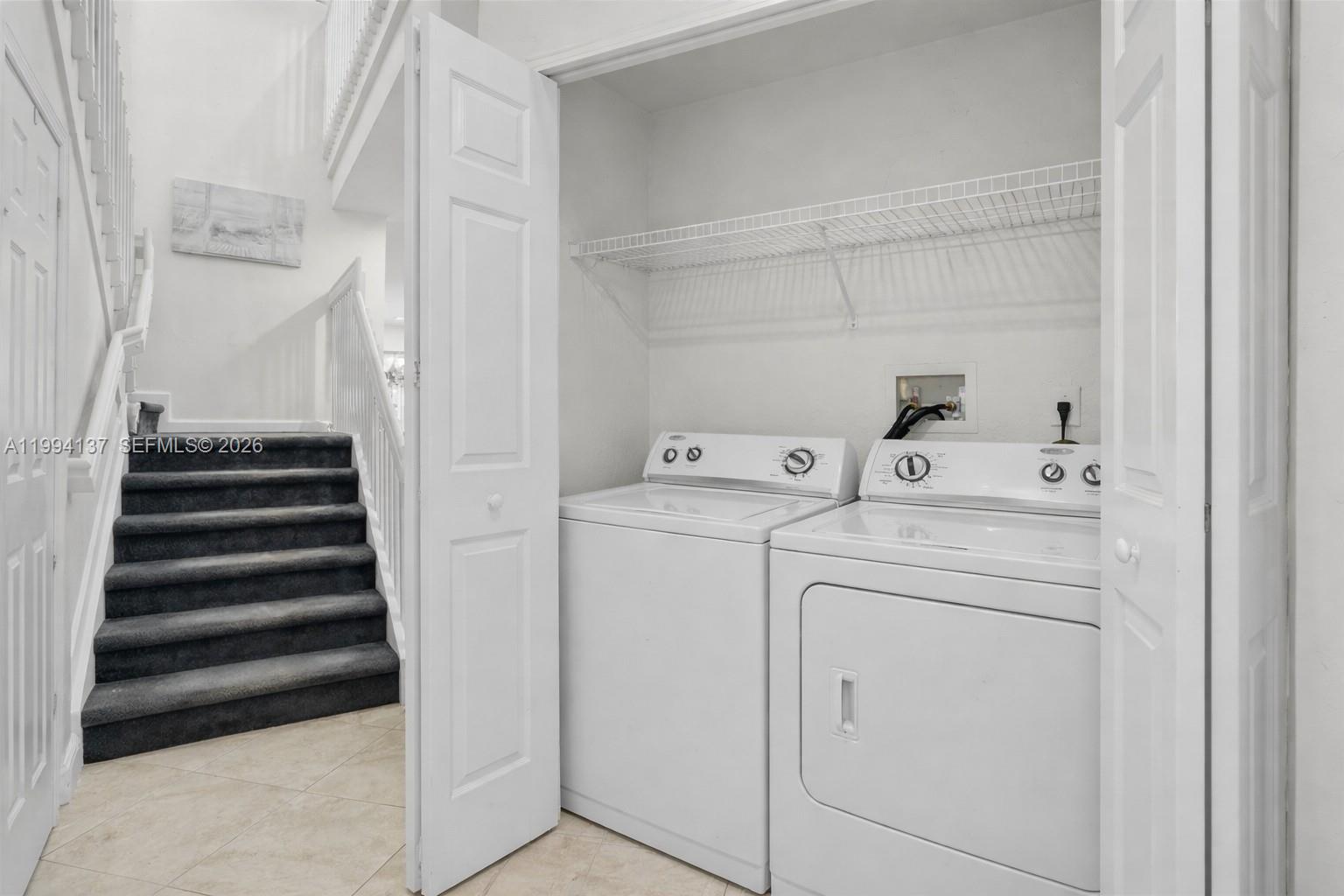 728 Southeast 2nd Street Pompano Beach, FL 33060 - Photo 16 of 27 a utility room with dryer and washer