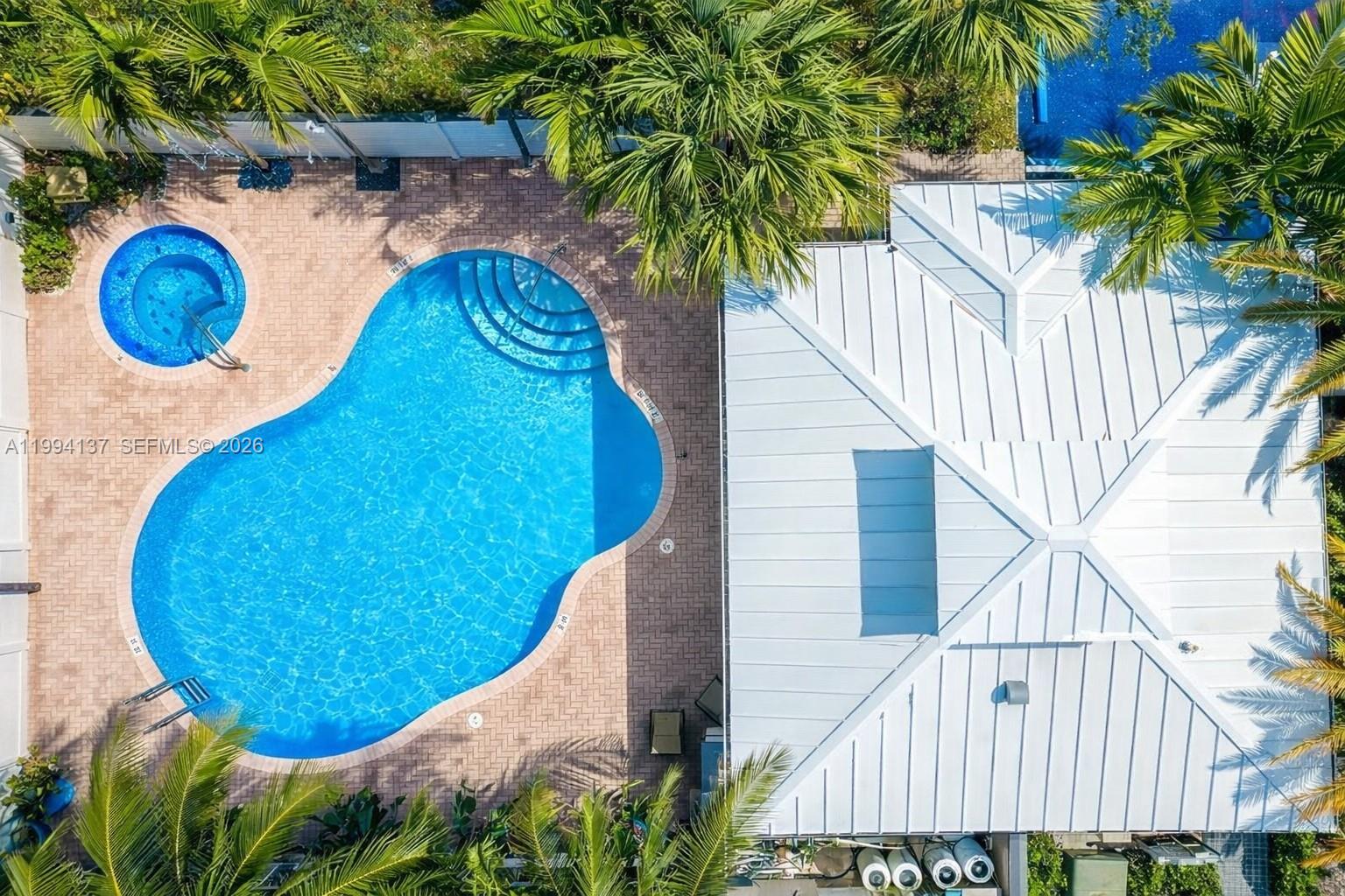 728 Southeast 2nd Street Pompano Beach, FL 33060 - Photo 20 of 27 a view of entryway with a swimming pool