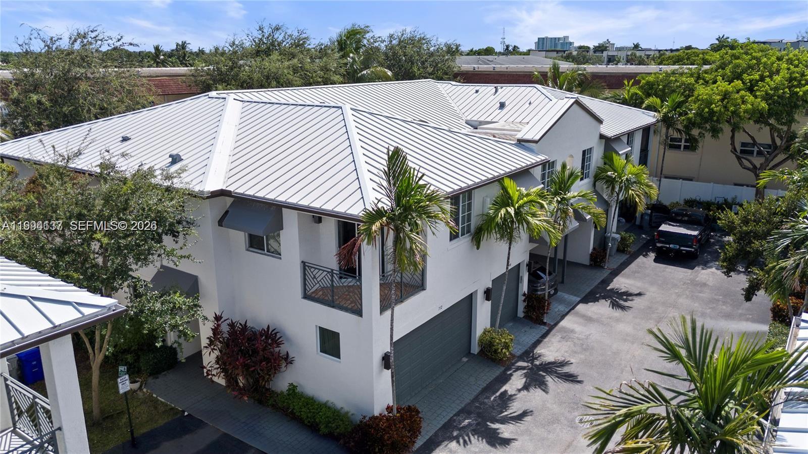 728 Southeast 2nd Street Pompano Beach, FL 33060 - Photo 26 of 27 an aerial view of a house with a yard