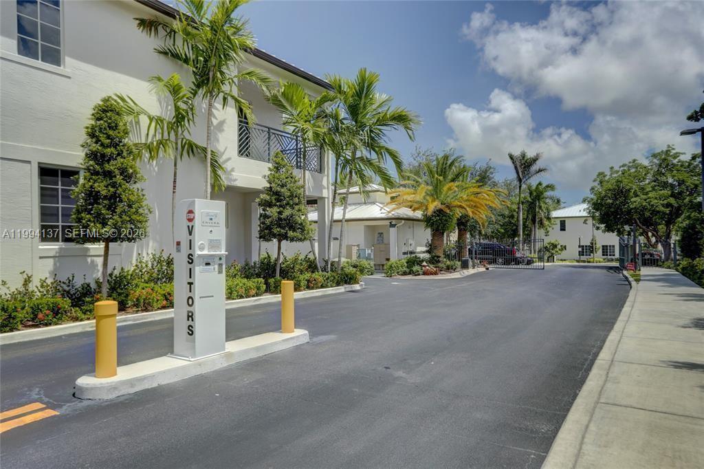 728 Southeast 2nd Street Pompano Beach, FL 33060 - Photo 27 of 27 a row of palm trees in front of house
