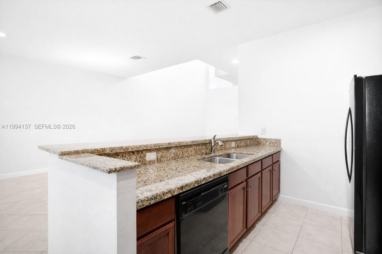 728 Southeast 2nd Street Pompano Beach, FL 33060 - Photo 8 of 27 a view of storage and utility room