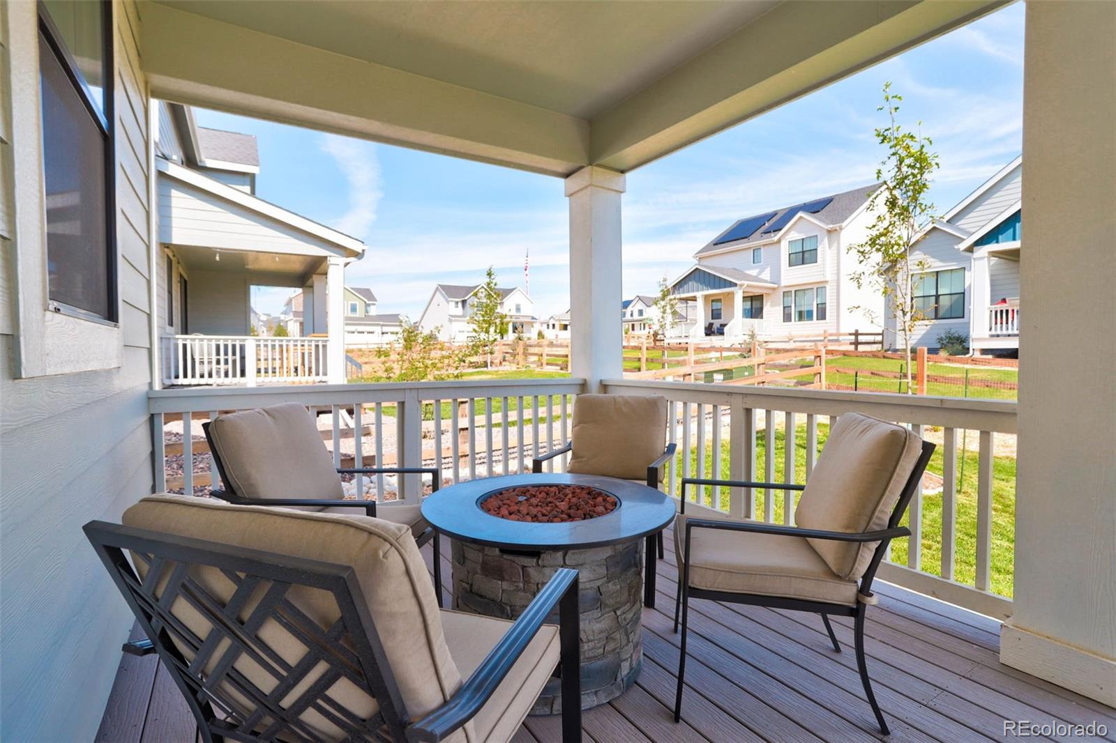 1131 Williams Loop Elizabeth, CO 80107 - Photo 15 of 40 a view of a dining room with furniture a rug and wooden floor