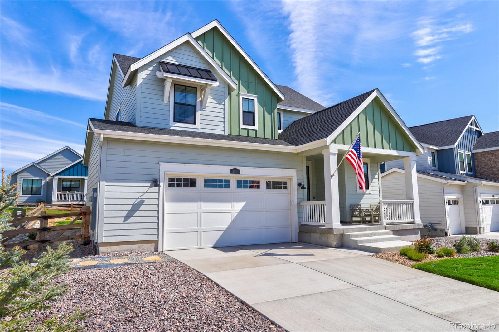 1131 Williams Loop Elizabeth, CO 80107 - Photo 2 of 40 a front view of house with garage and yard