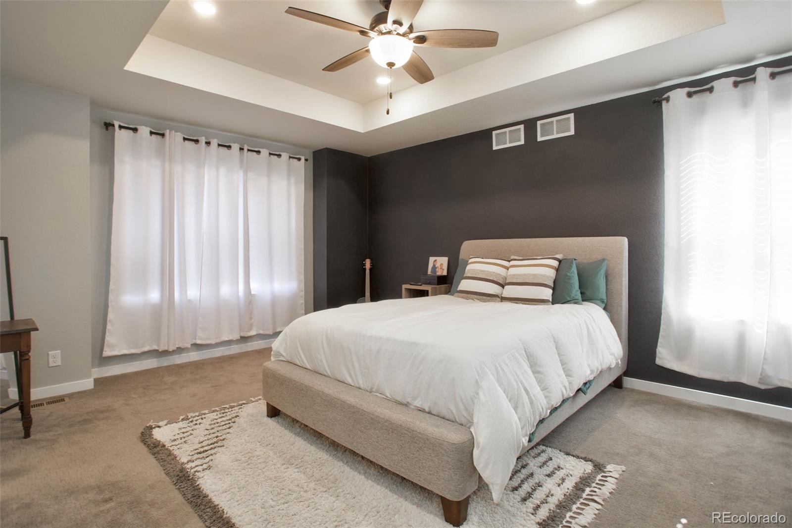 1131 Williams Loop Elizabeth, CO 80107 - Photo 22 of 40 a bedroom with a bed and window