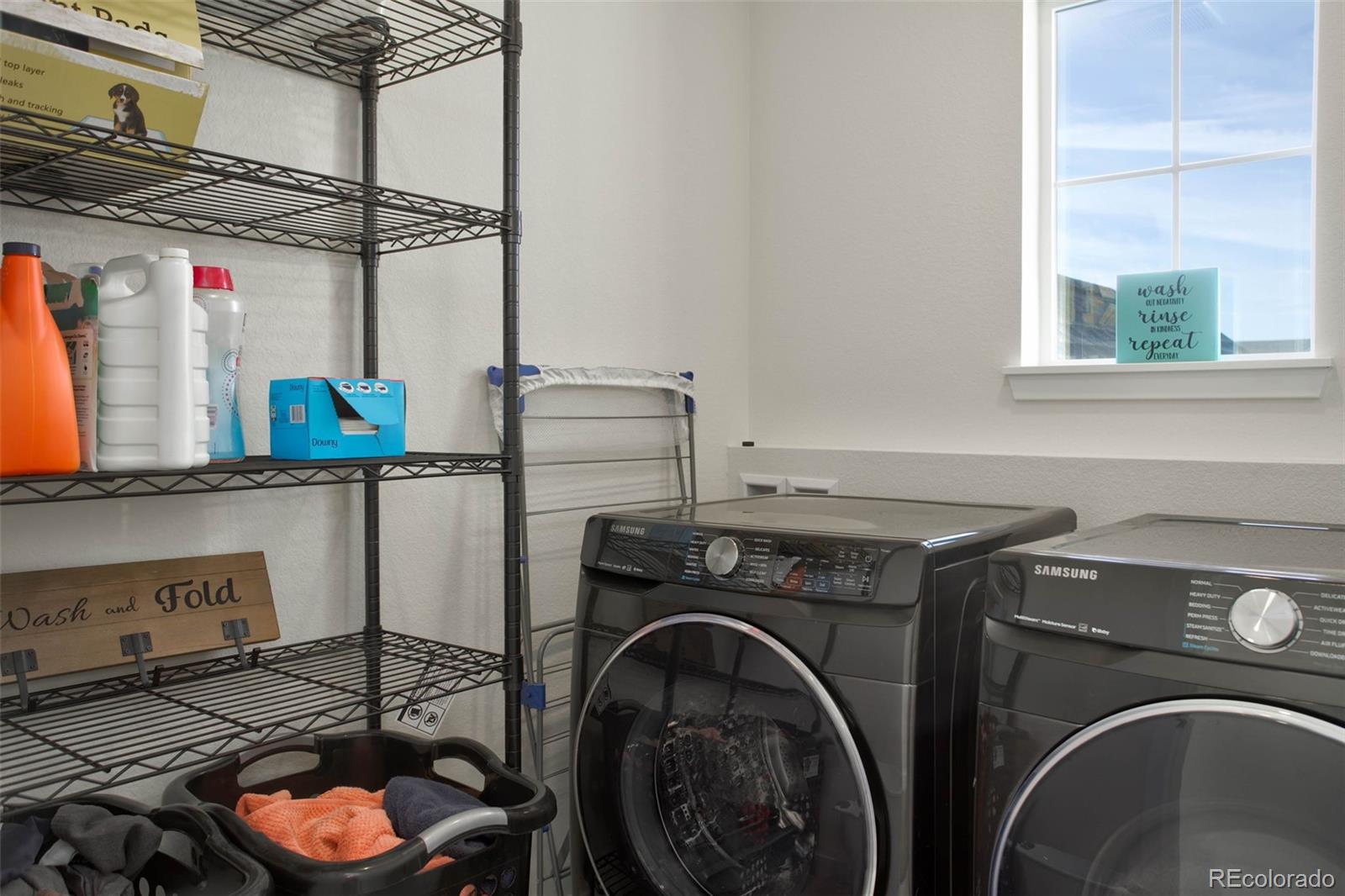 1131 Williams Loop Elizabeth, CO 80107 - Photo 34 of 40 a utility room with dryer and washer