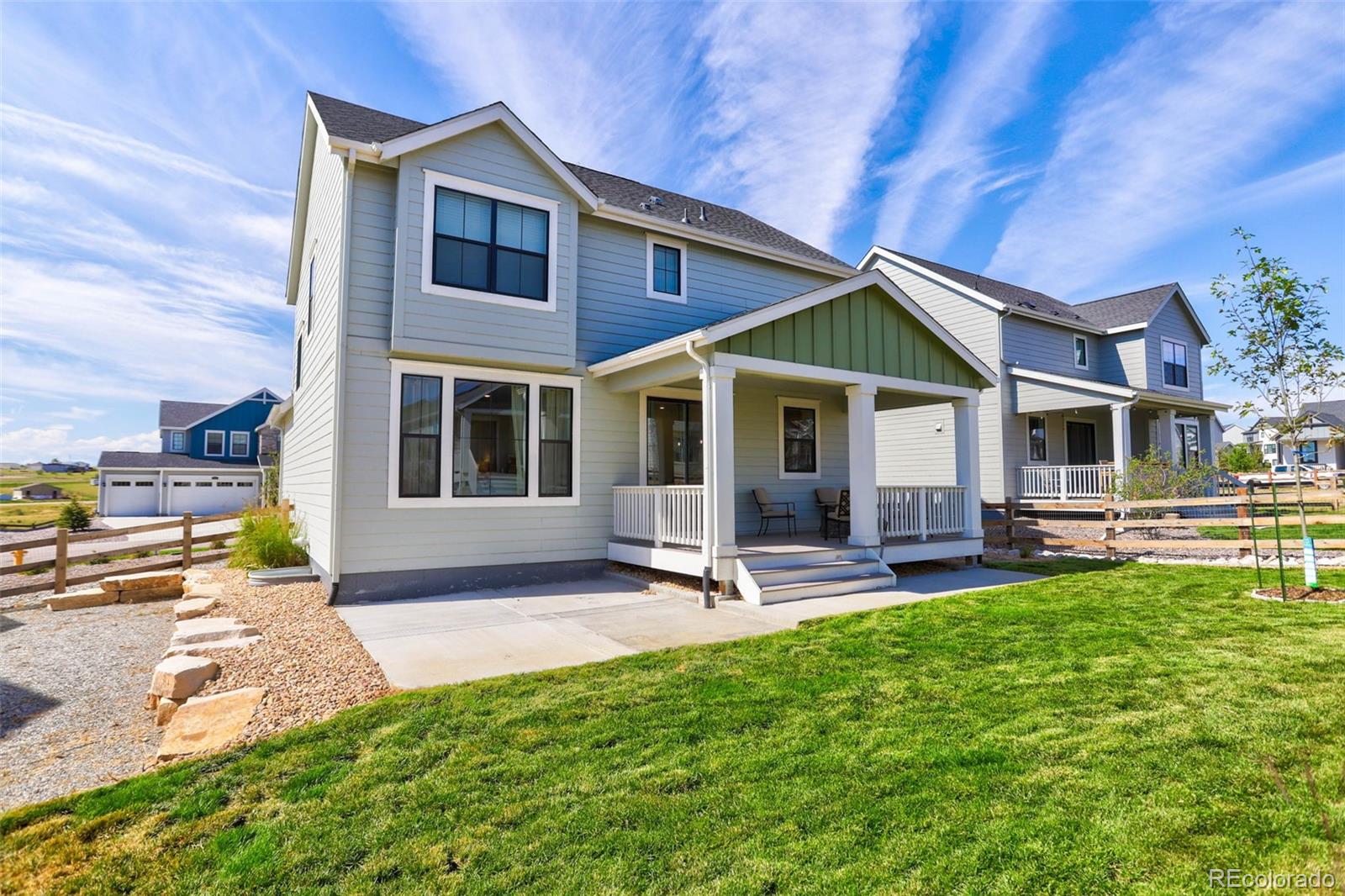1131 Williams Loop Elizabeth, CO 80107 - Photo 36 of 40 a view of a house with a yard and sitting area