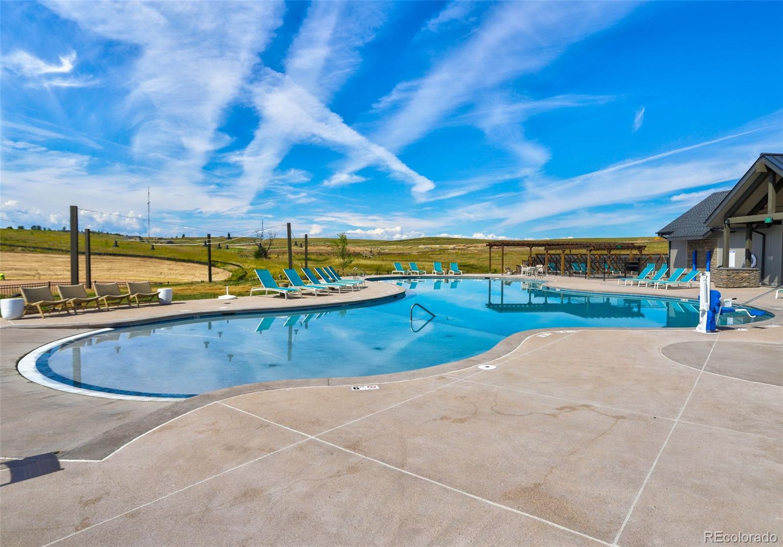 1131 Williams Loop Elizabeth, CO 80107 - Photo 39 of 40 a view of a swimming pool with an outdoor seating