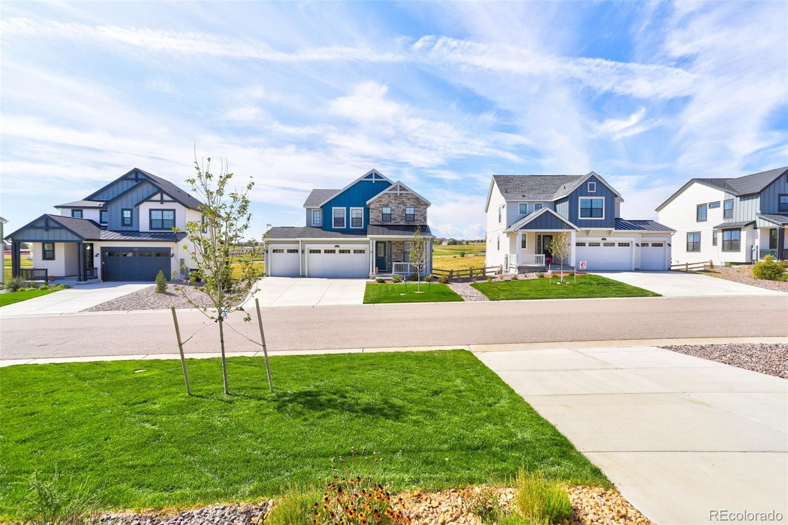 1131 Williams Loop Elizabeth, CO 80107 - Photo 5 of 40 a front view of house with yard and green space