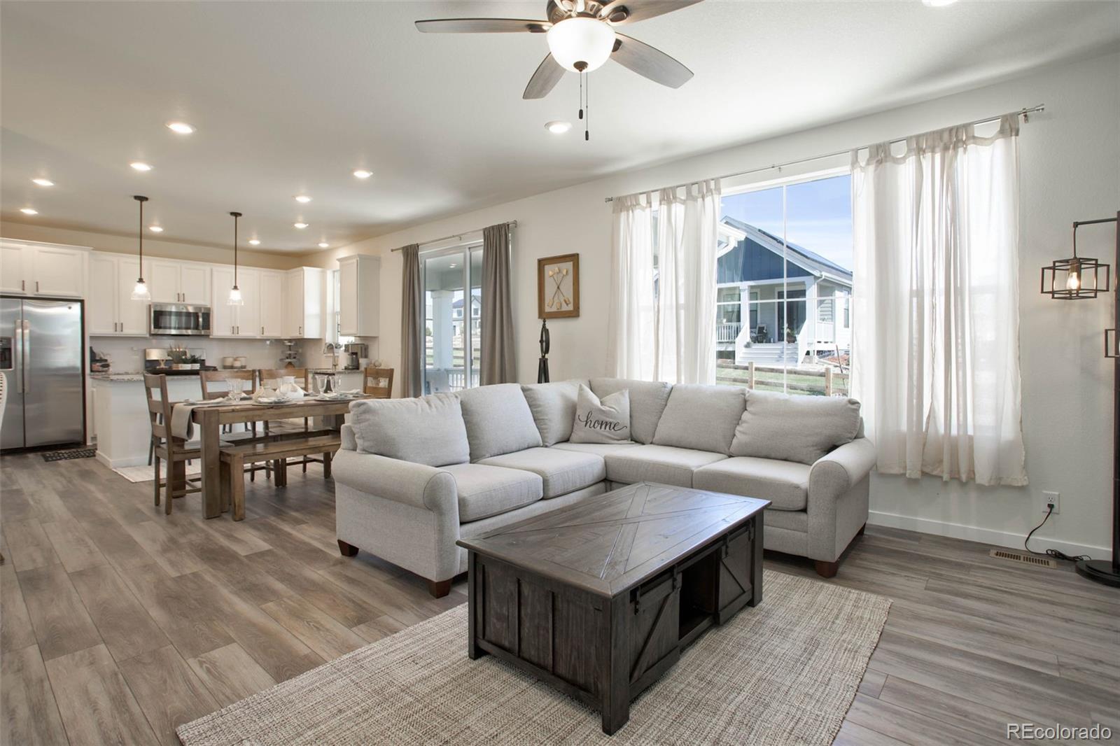 1131 Williams Loop Elizabeth, CO 80107 - Photo 8 of 40 a living room with furniture and a large window