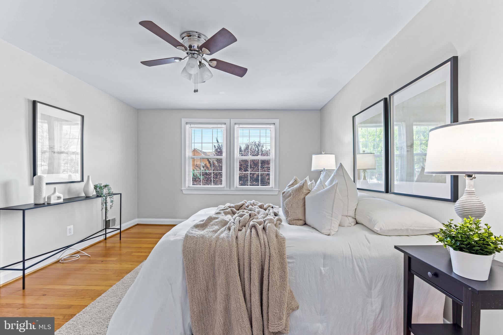 313 Greenlow Road Baltimore, MD 21228 - Photo 23 of 38 a bedroom with a bed and window