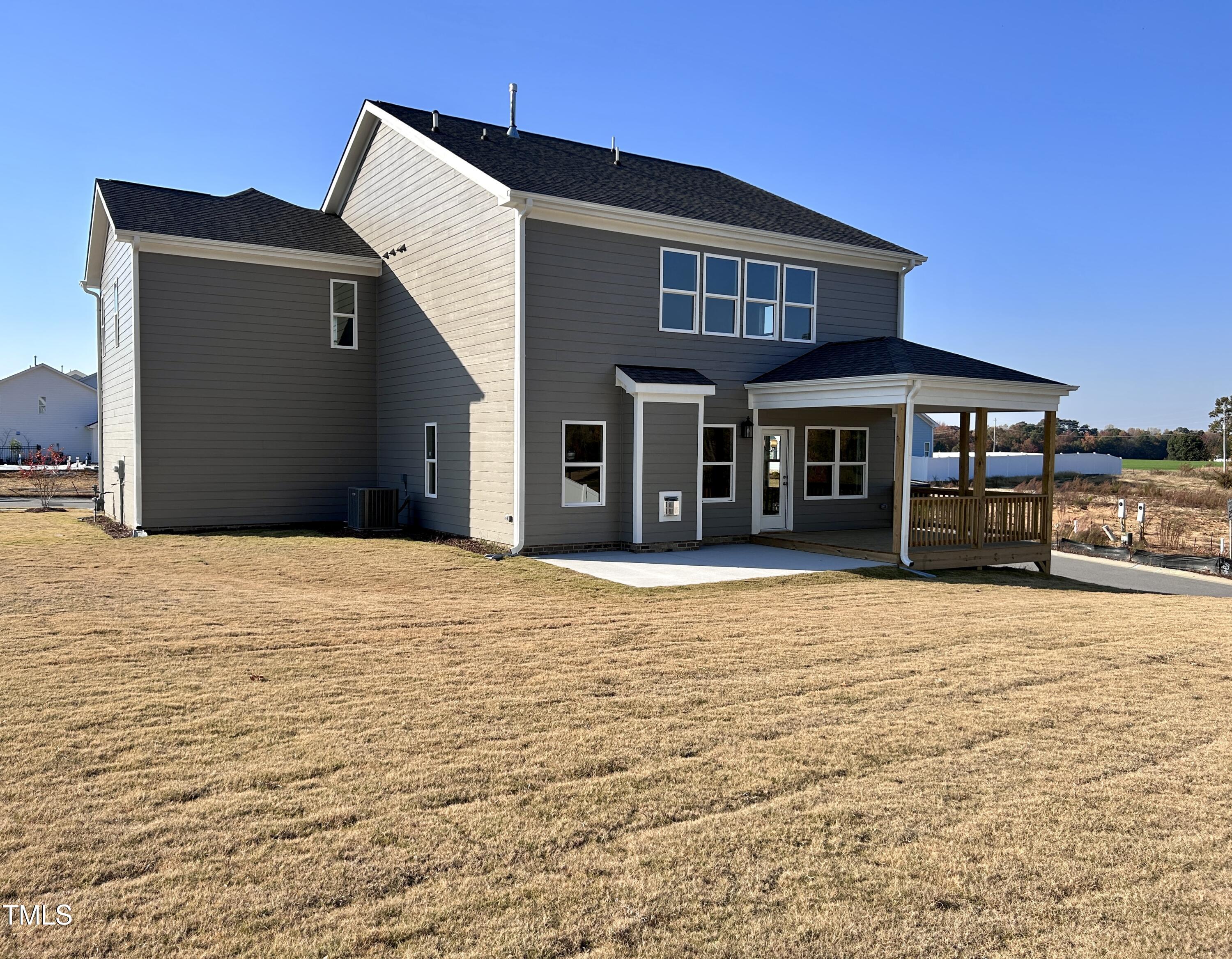 1220 Marsh Hawk Way Wake Forest, NC 27587 - Photo 21 of 23 a front view of a house with a yard