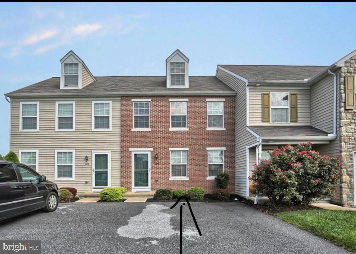 126 Radle Road Harrisburg, PA 17112 - Photo 1 of 4 Charming townhouse with inviting facade.