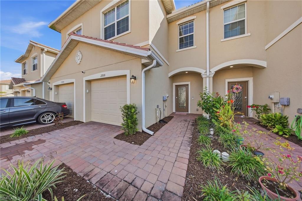 2930 Citrus Street Naples, FL 34120 - Photo 1 of 35 a house view with a garden space