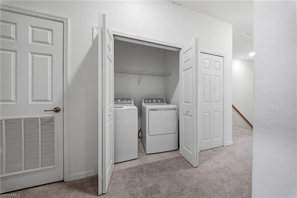 2930 Citrus Street Naples, FL 34120 - Photo 20 of 35 a utility room with dryer and washer