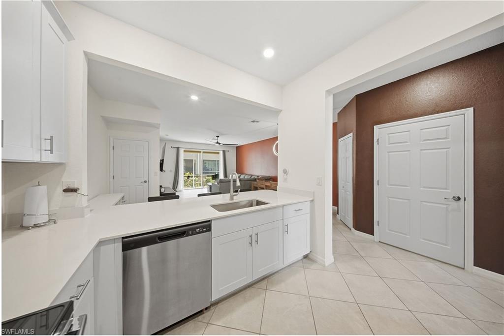 2930 Citrus Street Naples, FL 34120 - Photo 35 of 35 a kitchen with a sink and cabinets