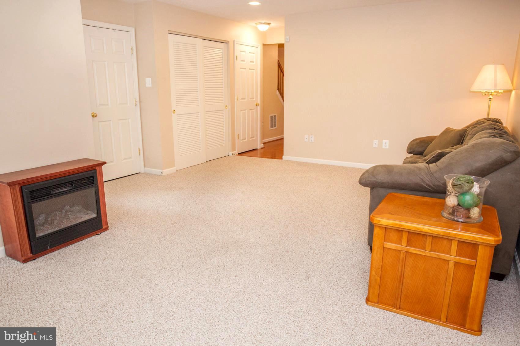 9834 Decatur Road Baltimore, MD 21220 - Photo 4 of 29 Fist floor entertainment area!