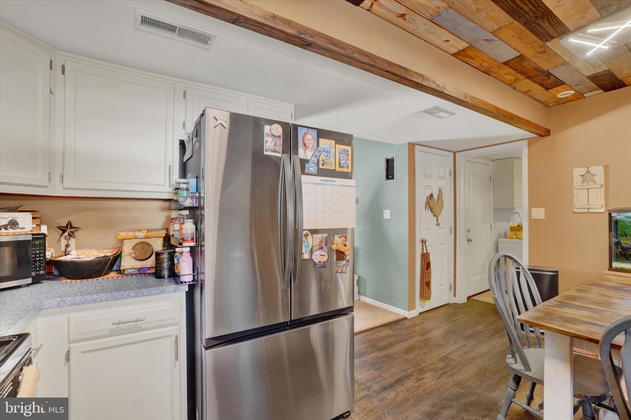 3030 Solar Drive Dover, PA 17315 - Photo 7 of 22 a kitchen with stainless steel appliances granite countertop a refrigerator a stove and a sink with dishwasher