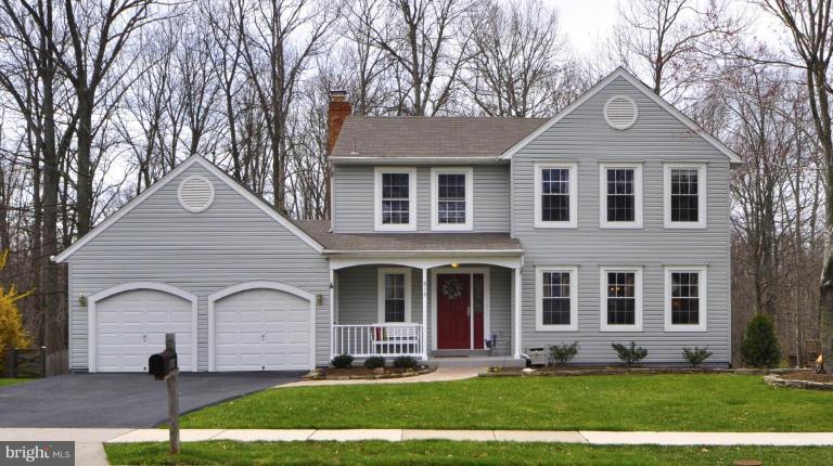 812 Potomac Ridge Court Sterling, VA 20164 - Photo 1 of 30 a front view of a house with a yard