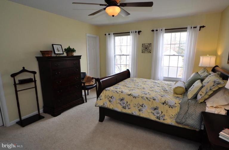812 Potomac Ridge Court Sterling, VA 20164 - Photo 13 of 30 a bedroom with a bed and window