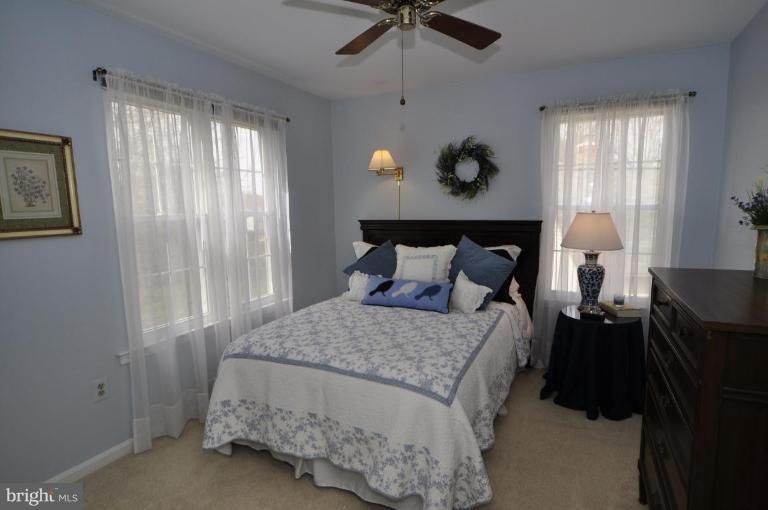 812 Potomac Ridge Court Sterling, VA 20164 - Photo 16 of 30 a bedroom with a bed and window