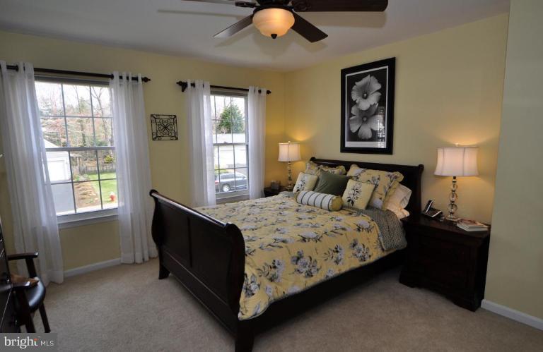 812 Potomac Ridge Court Sterling, VA 20164 - Photo 19 of 30 a bedroom with a bed and window