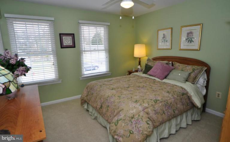 812 Potomac Ridge Court Sterling, VA 20164 - Photo 20 of 30 a bedroom with a bed and a window