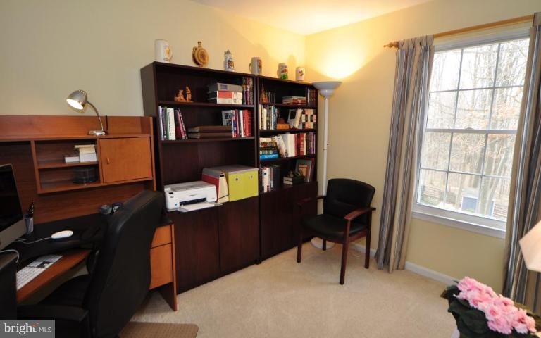 812 Potomac Ridge Court Sterling, VA 20164 - Photo 22 of 30 a living room with furniture and a window