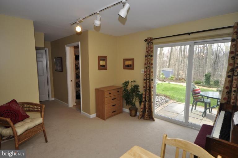 812 Potomac Ridge Court Sterling, VA 20164 - Photo 25 of 30 a view of livingroom with furniture and floor to ceiling window