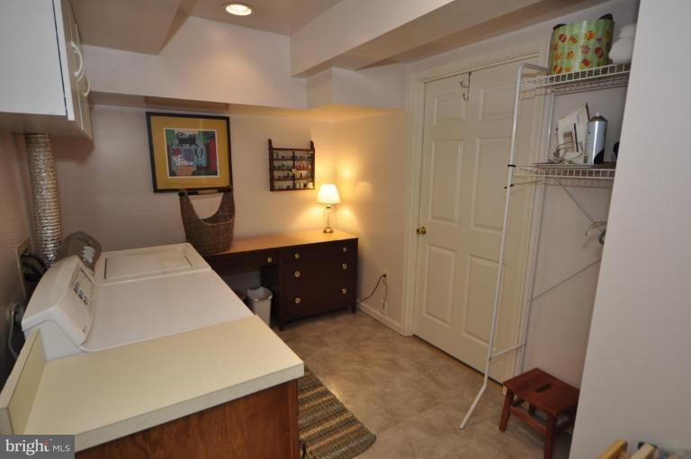 812 Potomac Ridge Court Sterling, VA 20164 - Photo 26 of 30 a en suite bathroom with a granite countertop sink and a mirror