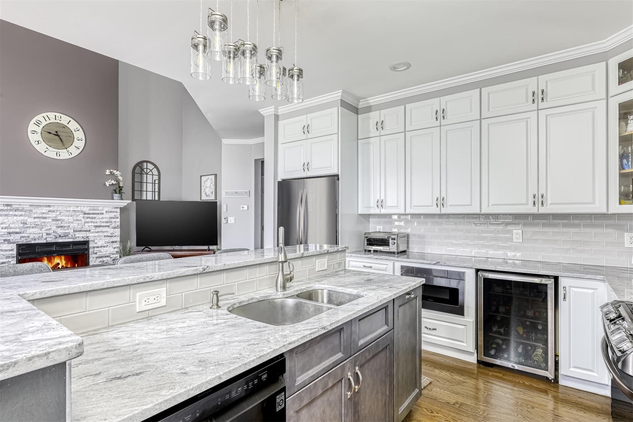 New White kitchen with center island.