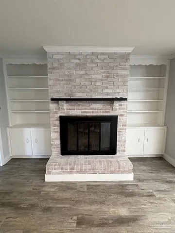 a living room with a fireplace
