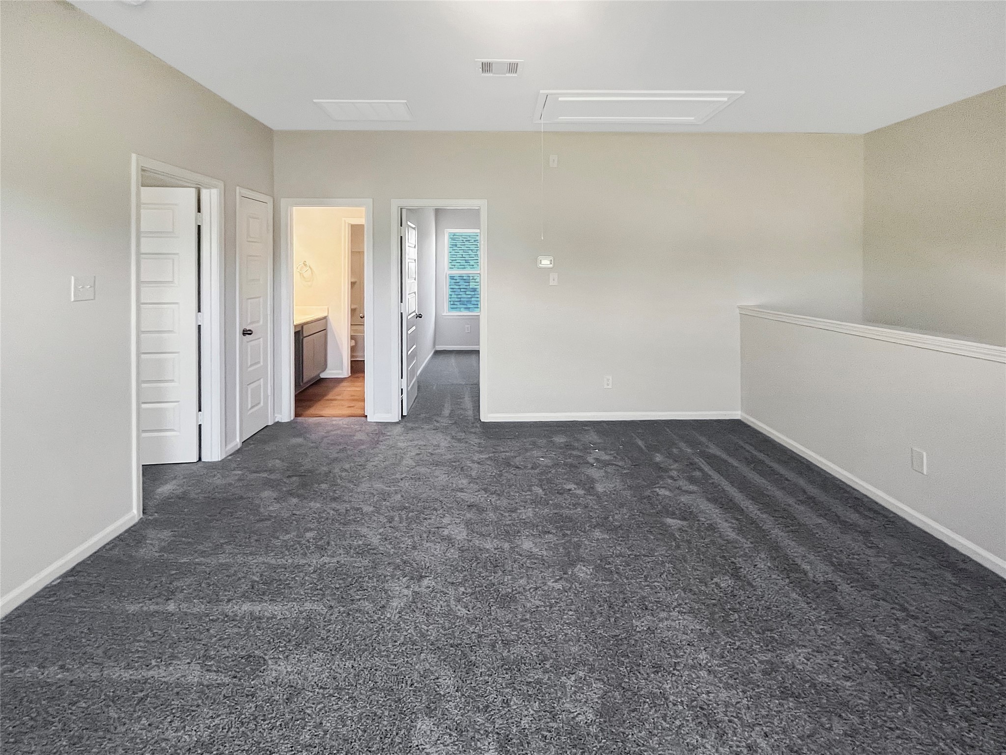 9758 Enclave Ridge Road Willis, TX 77318 - Photo 13 of 25 a view of an empty room