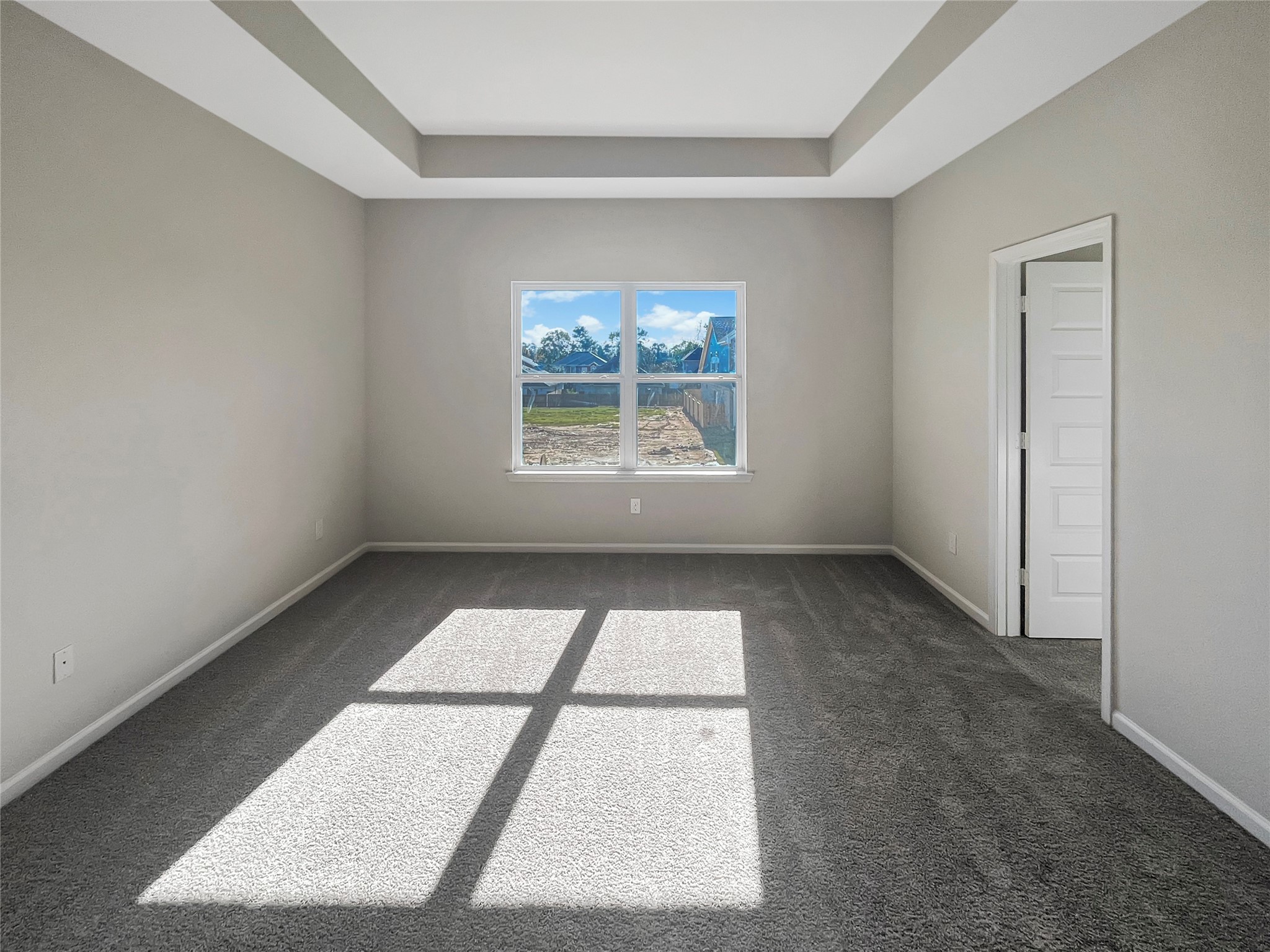 9758 Enclave Ridge Road Willis, TX 77318 - Photo 15 of 25 an empty room with a white walls next to a window