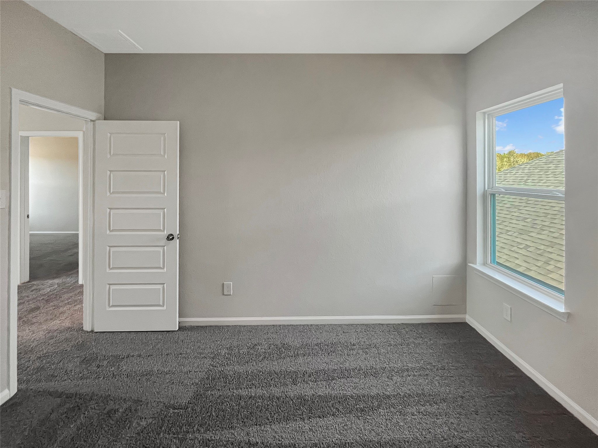 9758 Enclave Ridge Road Willis, TX 77318 - Photo 19 of 25 wooden floor in an empty room