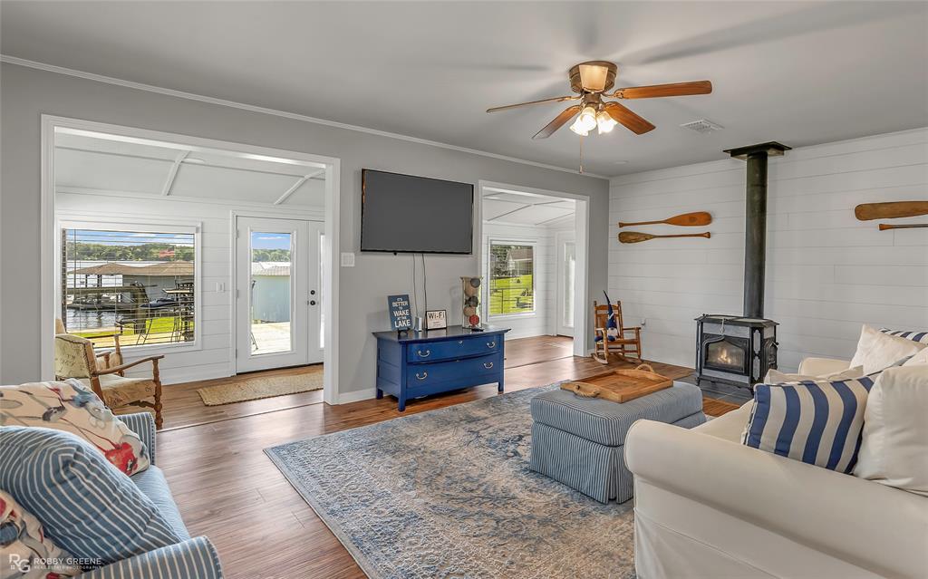 1615 Airport Loop Homer, LA 71040 - Photo 11 of 35 a living room with furniture and a large window