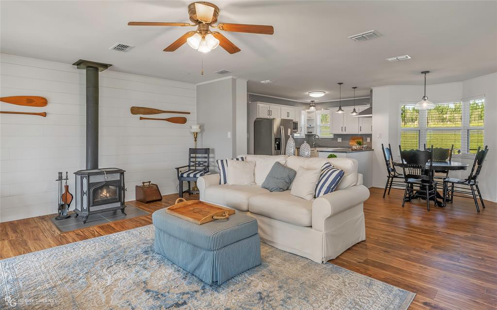 1615 Airport Loop Homer, LA 71040 - Photo 13 of 35 a living room with furniture and a large window