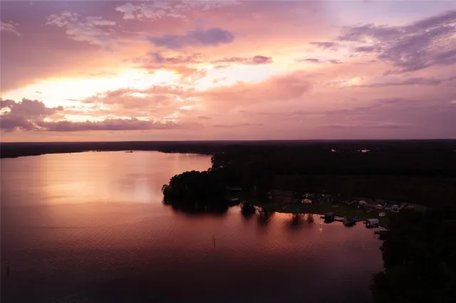 a view of outside space and a lake view