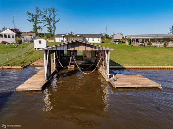 a view of a ocean with a nearby beach