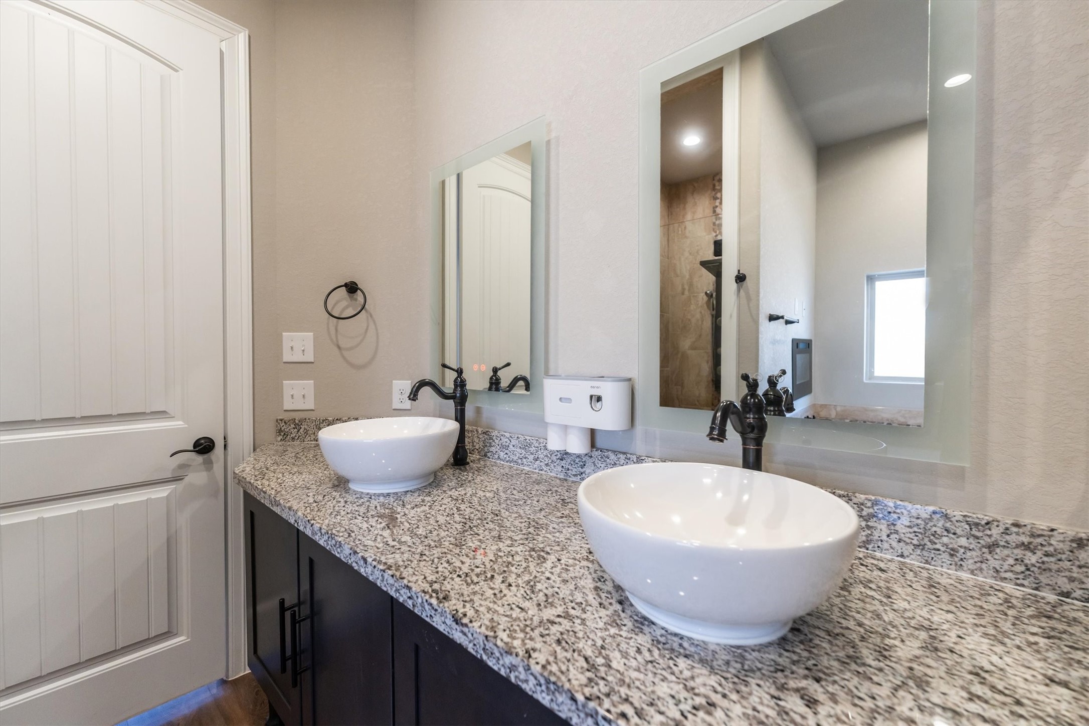 2172 Greentree Drive Huntsville, TX 77340 - Photo 29 of 45 Primary bathroom featuring dual-sinks with a modern feel.