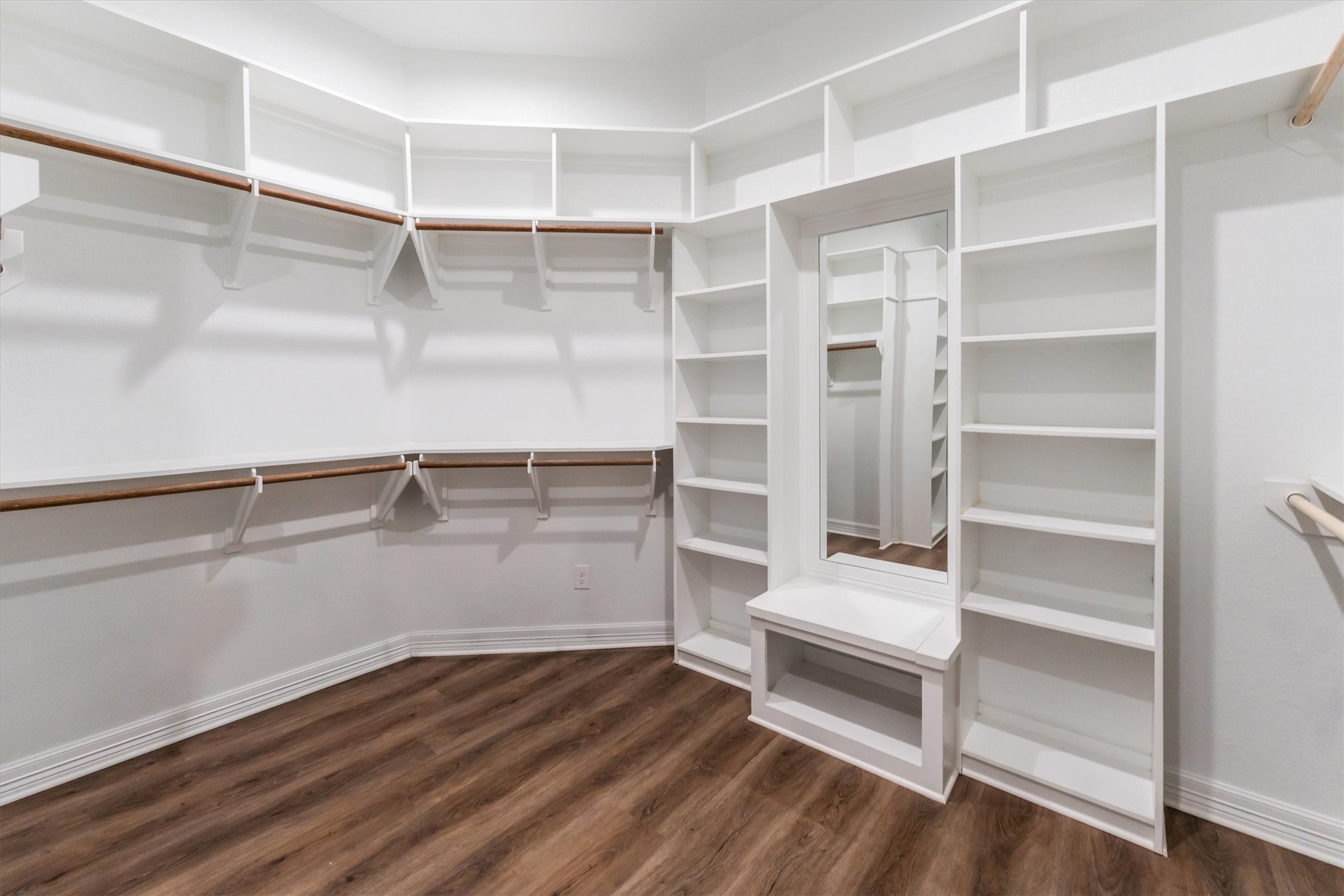 2172 Greentree Drive Huntsville, TX 77340 - Photo 34 of 45 Luxurious walk-in closet with elegant flow and built-in organization.