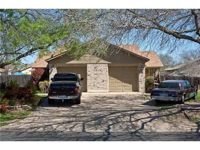 a car parked in front of a house