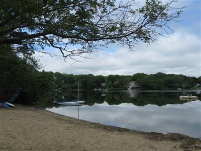 249 Holly Point Road Centerville, MA 02632 - Photo 2 of 20 a view of lake with mountain view