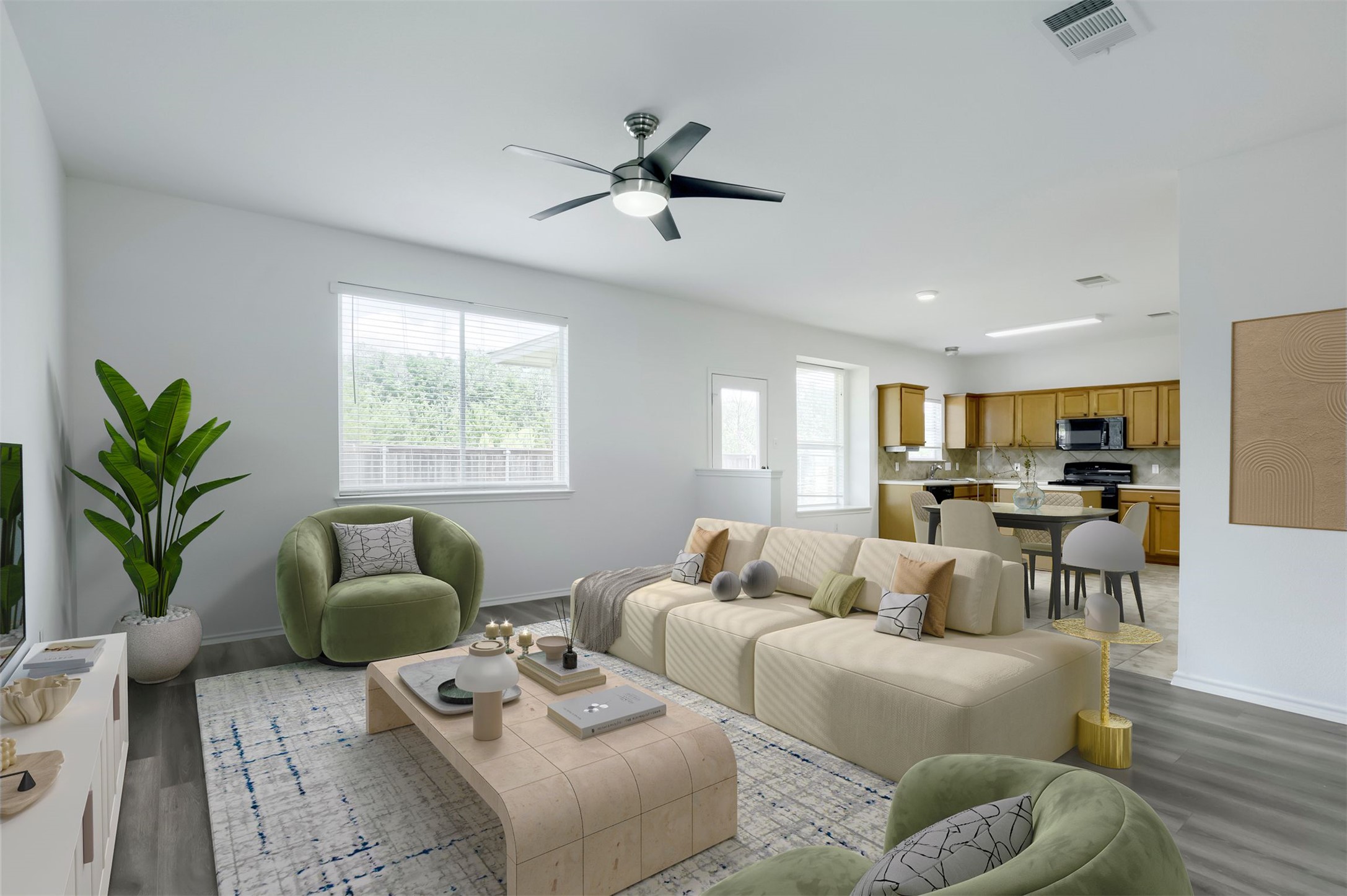 4125 Pebble Ridge Cove Round Rock, TX 78681 - Photo 7 of 30 An open concept living and kitchen area offers ample natural light and modern comforts with virtual staging.